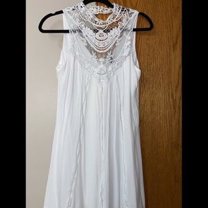 White dress from Rue 21. Only worn twice. Length comes just above the knees